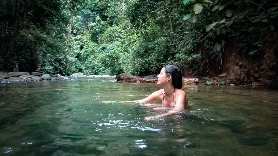 Bathing in the Bukit Lawang Jungle Camp River in Sumatra. Southeast asia trip in 20 days