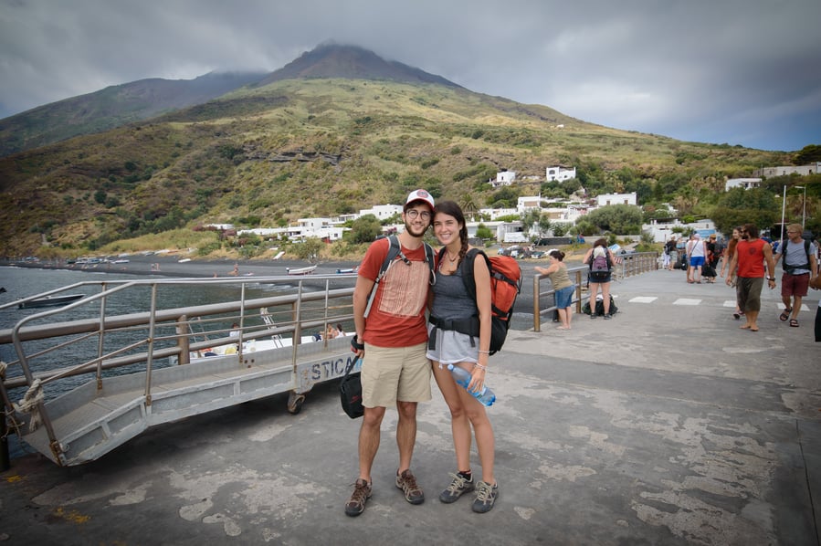 top things to do in stromboli New arrivals to the port of Stromboli Volcano in the background Italy Sicily