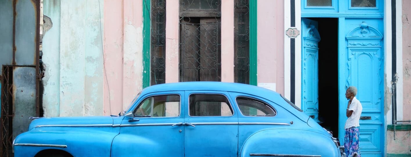 blue car cuban women