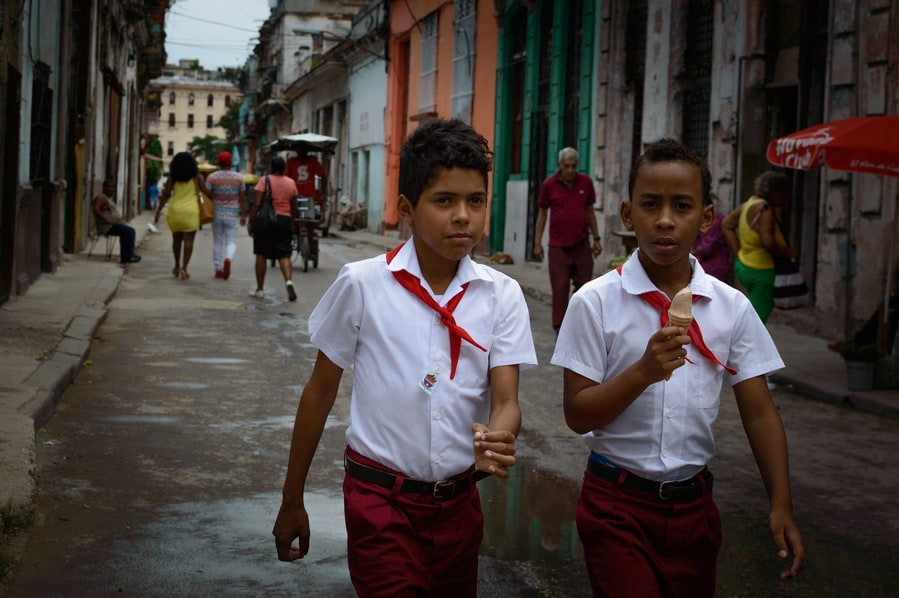 Children leaving school uniform guide to top things to do in Cuba