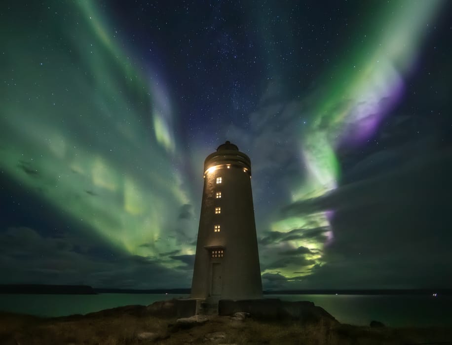 Skardsviti Lighthouse, best places to see the Northern Lights in Iceland