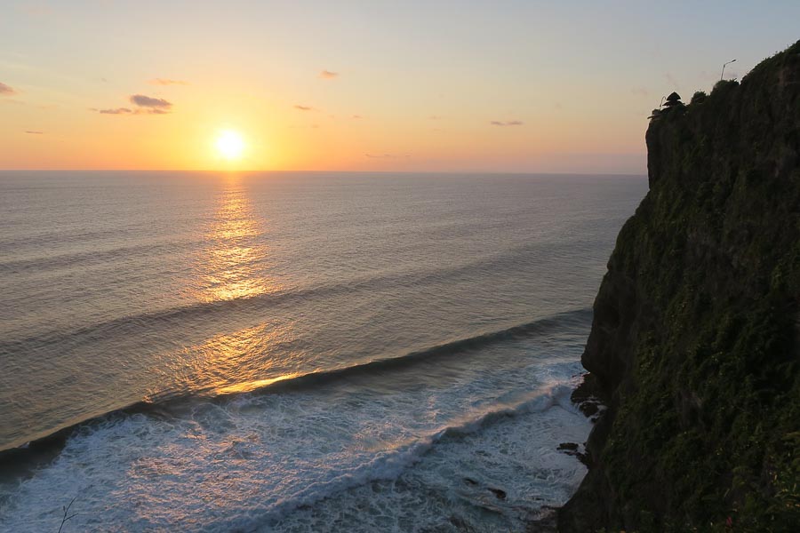 uluwatu temple at sunset, one of the quietest areas to stay in Bali