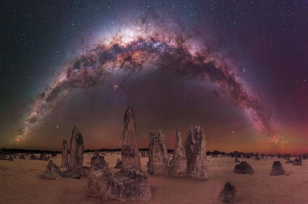“The Milky Way arching over The Pinnacles Desert” – Trevor Dobson