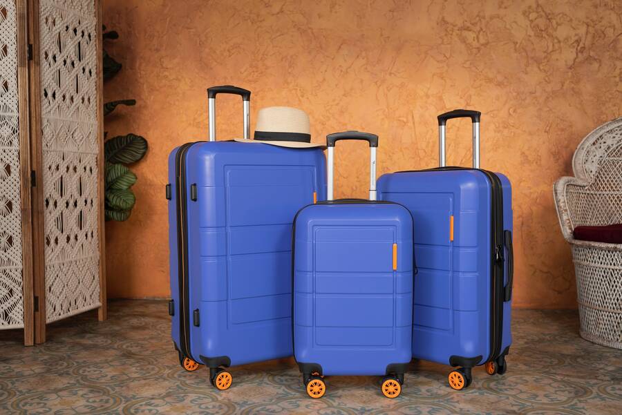 Set of blue suitcases, luggage storage airport
