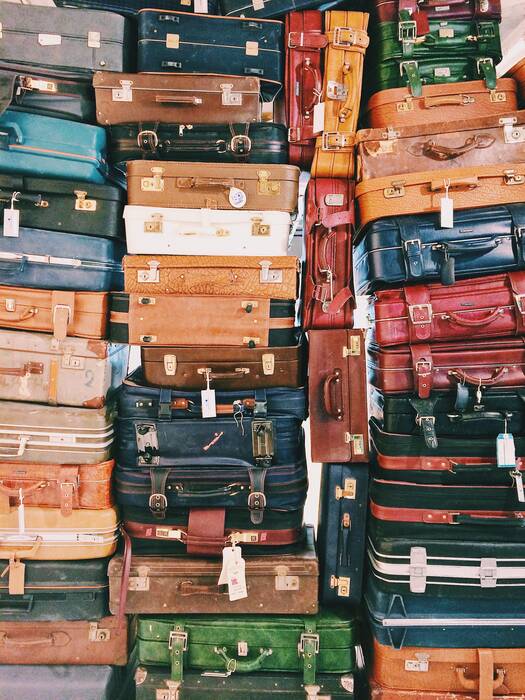 Stacks of suitcases, where to store luggage