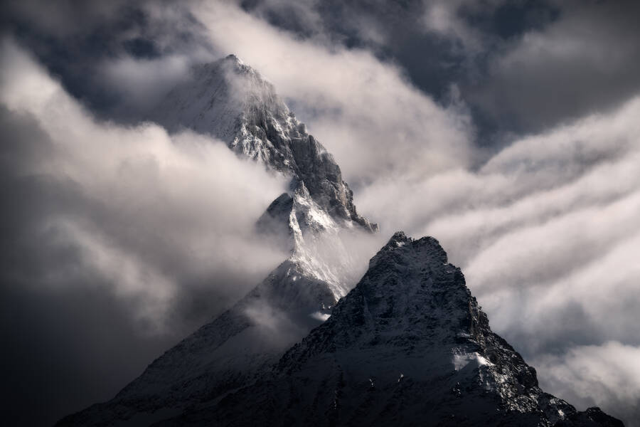 Dramatic light and clouds covering Schreckhorn