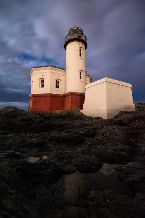 Coquille River Lighthouse in Oregon with dramatic clouds