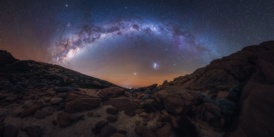 Milky Way arch over a desert in Australia