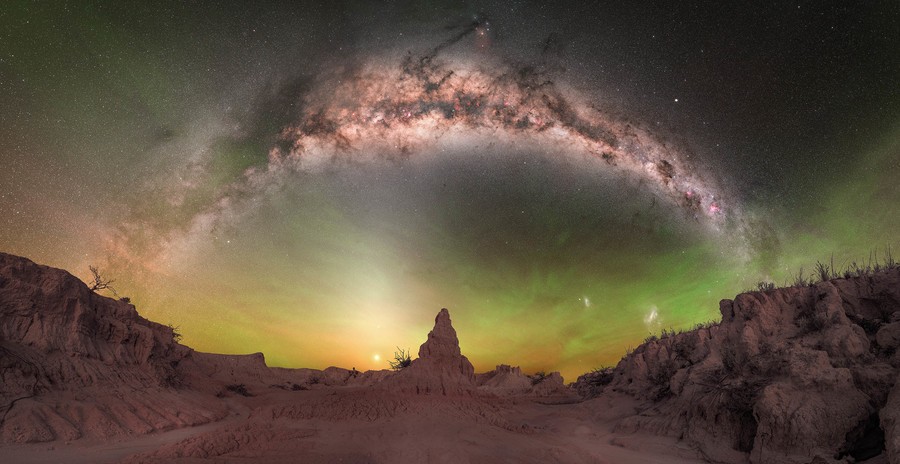 Milky Way arch and intense airglow over a lunette in Mungo National Park in the Australian Outback