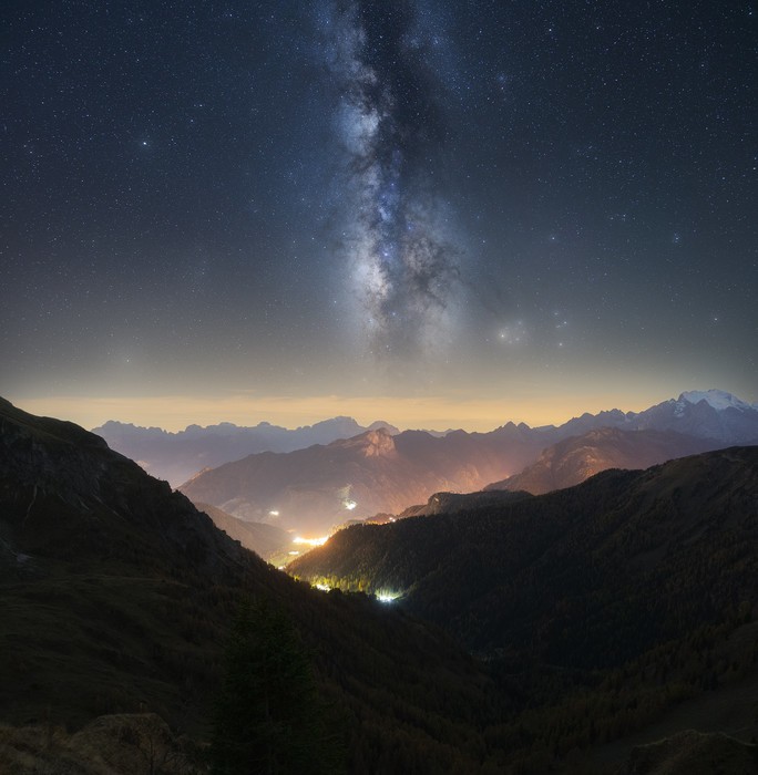Milky Way over Passo Giau and some villages in the distance