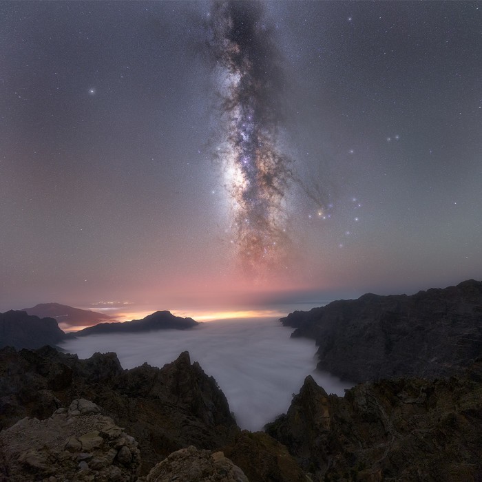 Milky Way over a sea of clouds in the island of La Palma, Spain