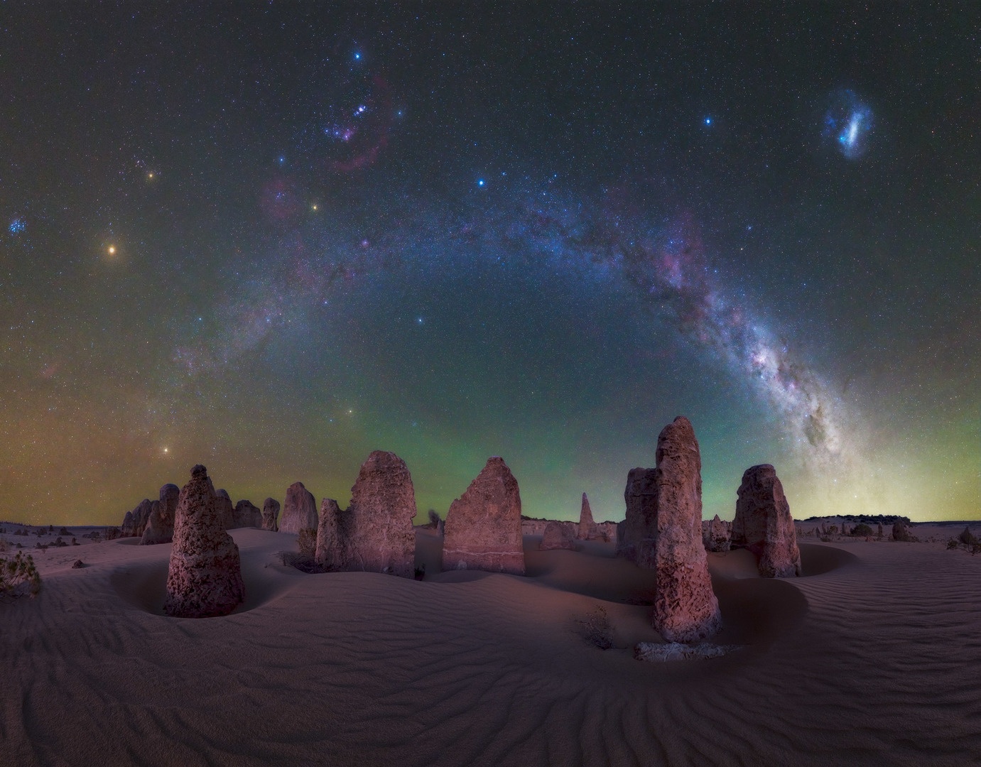 Milky Way over rock formations in a desert in Australia