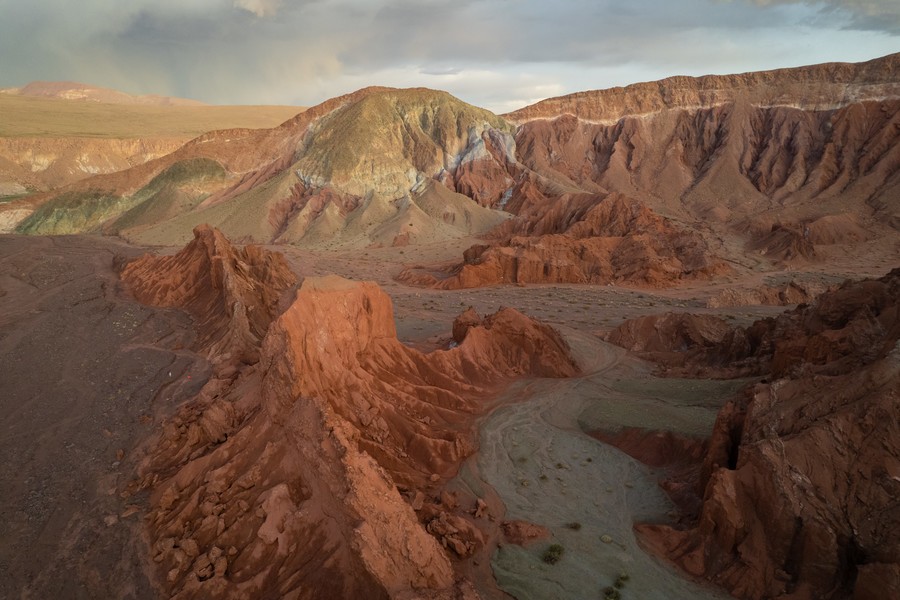 Aerial view of badlands and rock formations in Atacama Desert