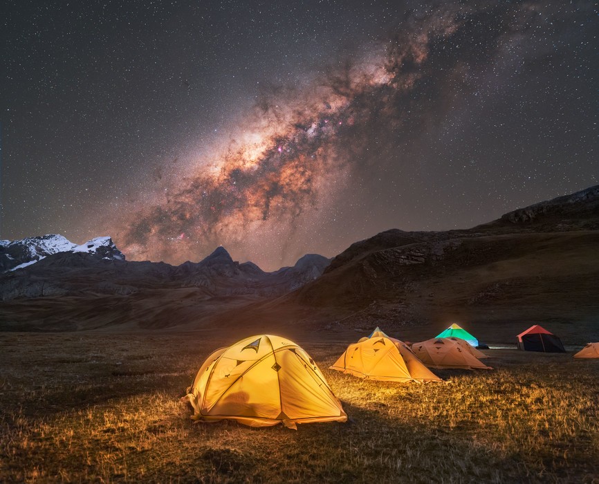 Milky Way cover the night sky over a campground in the Peruvian Andes
