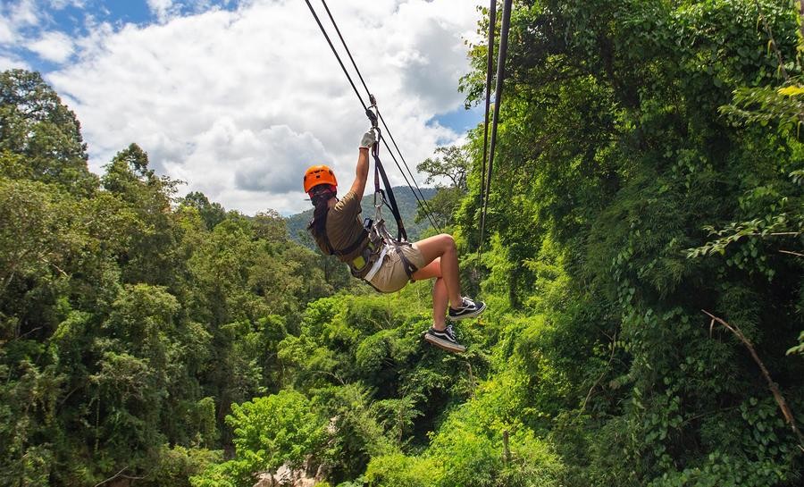 Zip-lining through the jungle, something fun to do with your family in Limón, Costa Rica