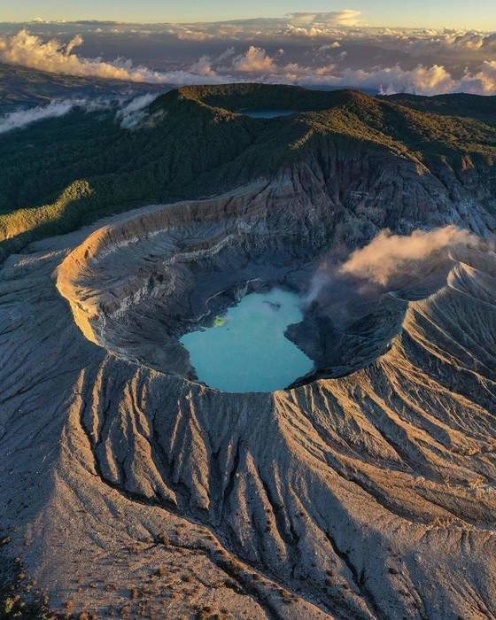 Blue lake at the crater on poas volcano