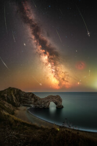 milky way in dorset, england milky way over durdle door, england